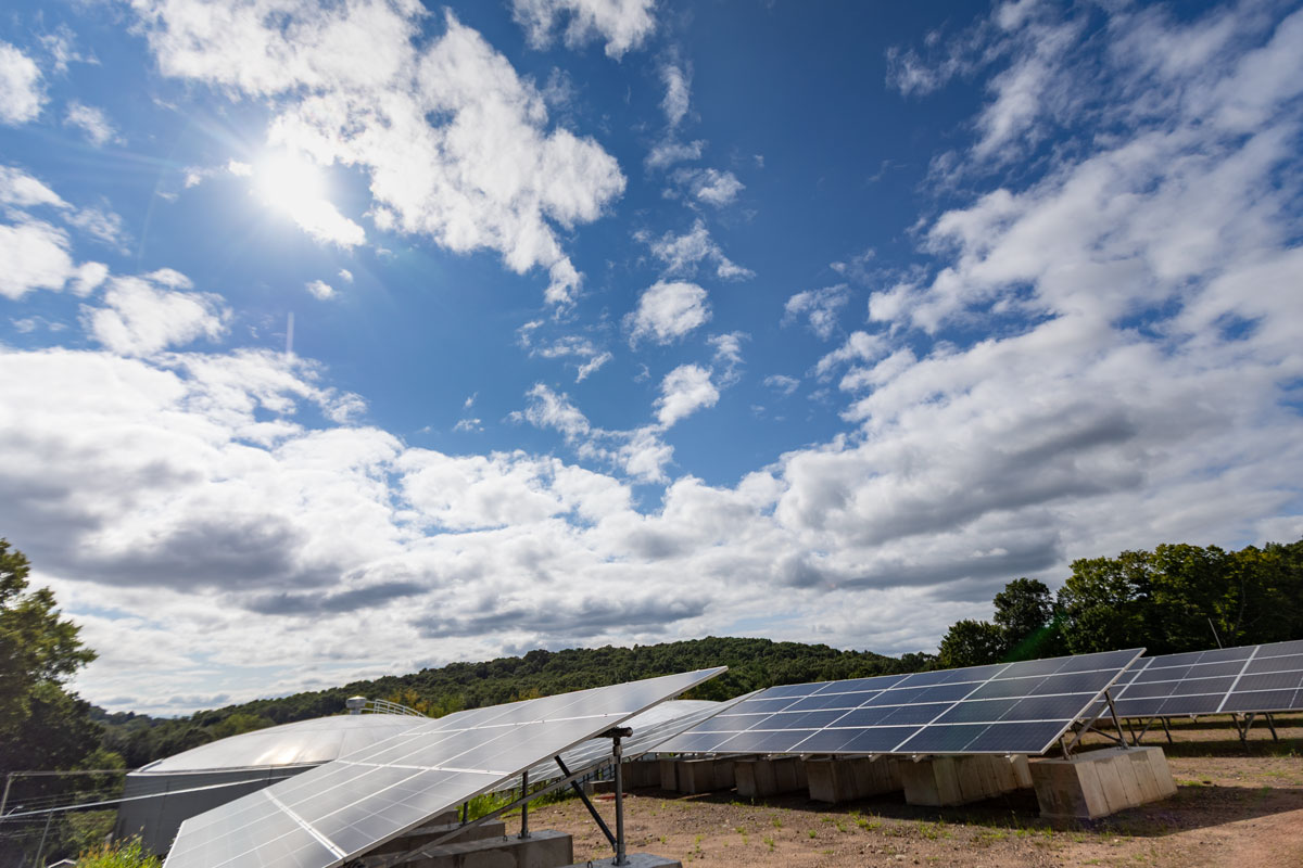 The sun shines on solar panels at Connecticut Water's Rockville Treatment Facility.